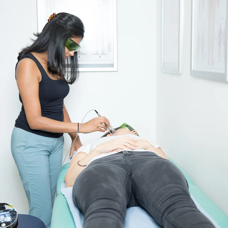 Performing laser TMJ therapy